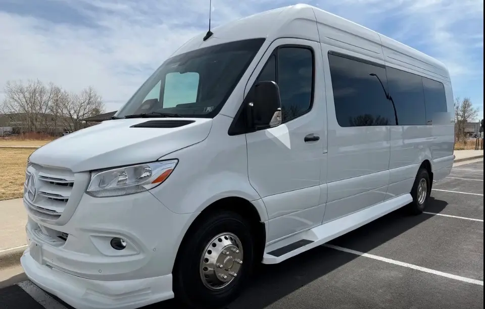 Laramie 16 passenger white Sprinter limo bus